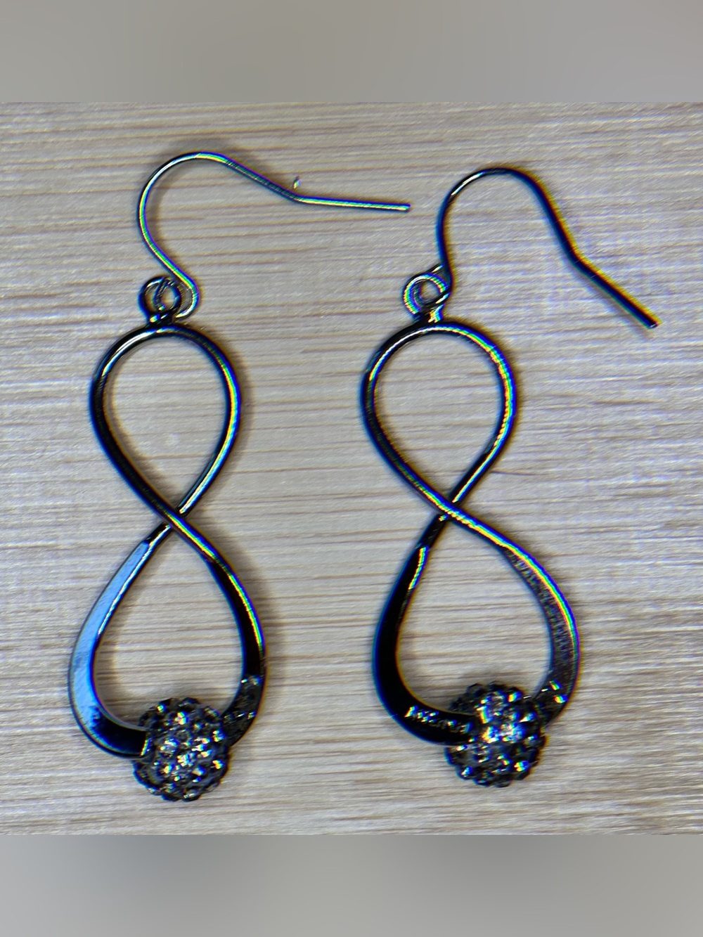 Silver Infinity Drop Earrings with Crystal Accent